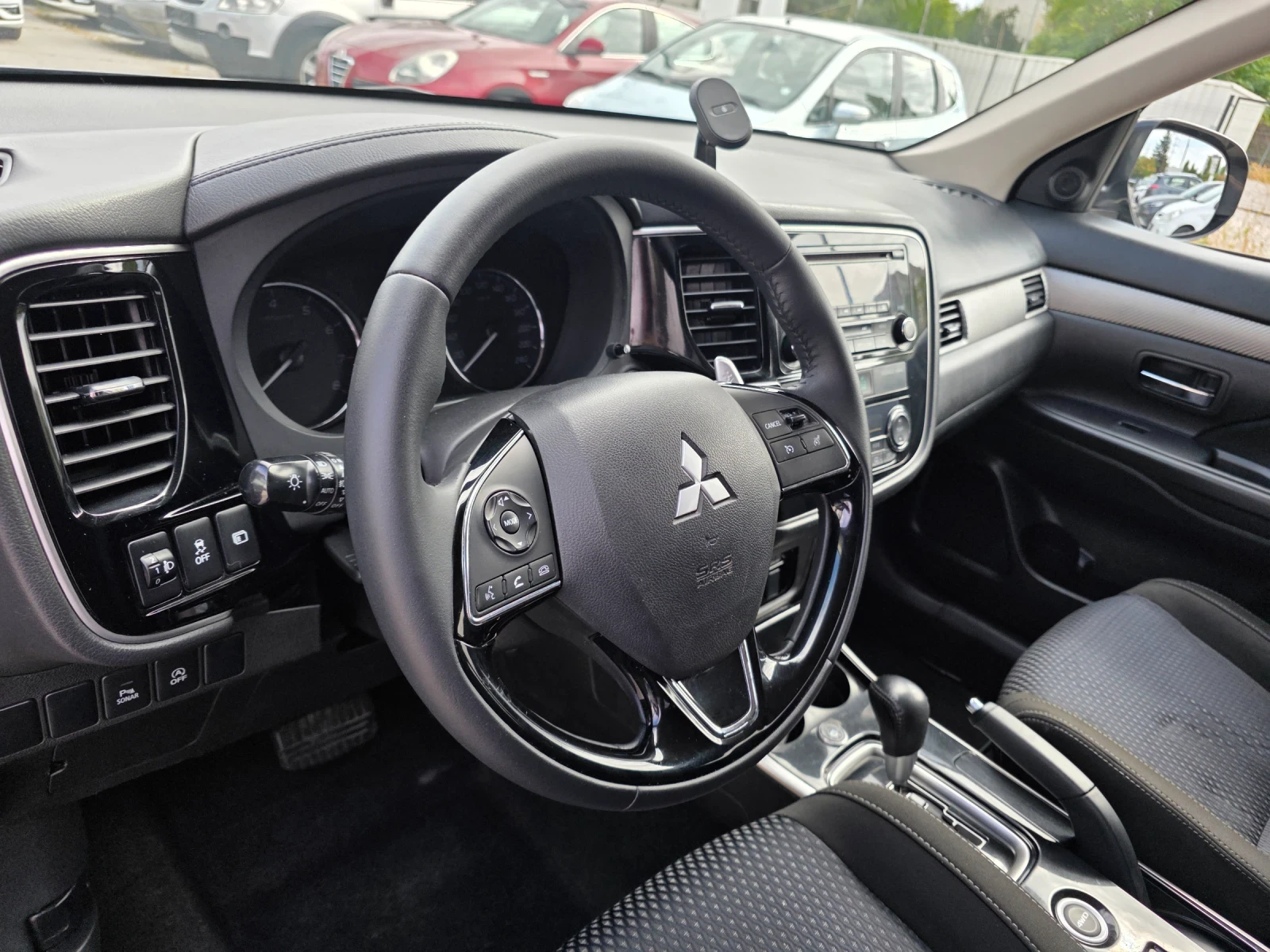 Mitsubishi Outlander 2.0i 150k.c 4x4 ITALIA EURO 6B , снимка 8 - Автомобили и джипове - 56229621