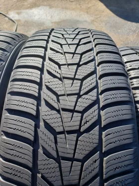      215/55R18