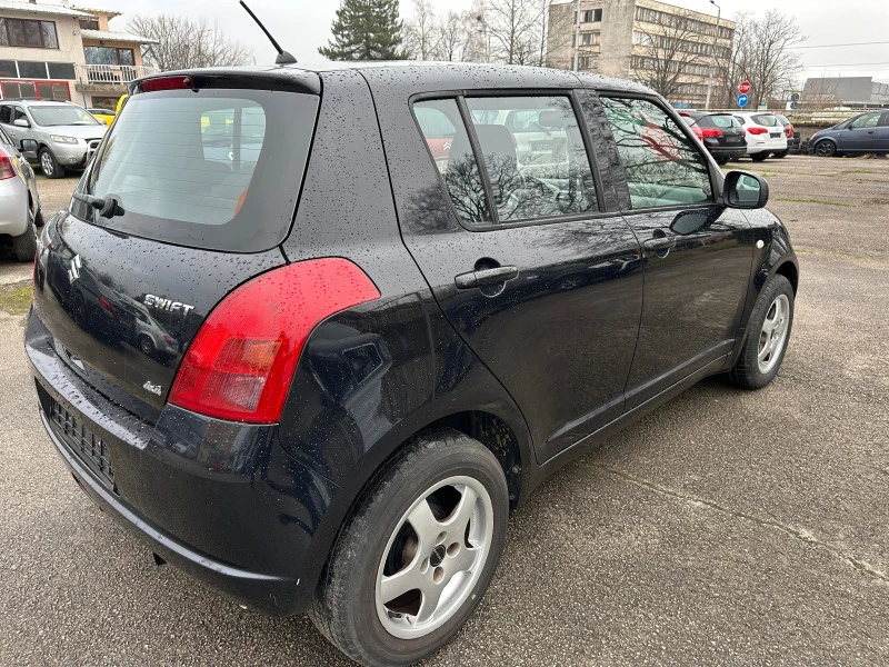 Suzuki Swift 1.3I-92kc 4x4, снимка 7 - Автомобили и джипове - 47051440