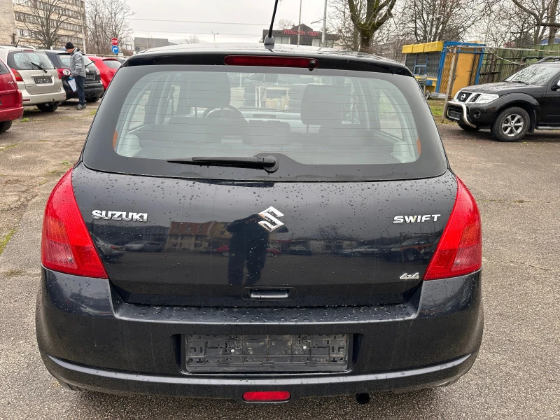 Suzuki Swift 1.3I-92kc 4x4, снимка 6 - Автомобили и джипове - 47051440