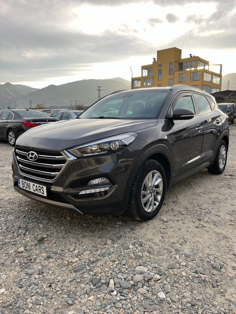 Hyundai Tucson 2.0 CRDI 4x4-automat-key less-navi, снимка 1 - Автомобили и джипове - 42179174