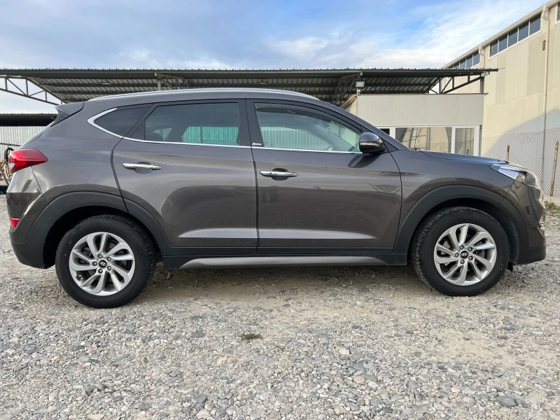 Hyundai Tucson 2.0 CRDI 4x4-automat-key less-navi, снимка 4 - Автомобили и джипове - 42179174