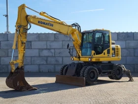 Багер Komatsu PW148-8
