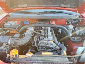 Suzuki Grand vitara 2.0 benzin 4x4, снимка 13 - Автомобили и джипове - 53664799