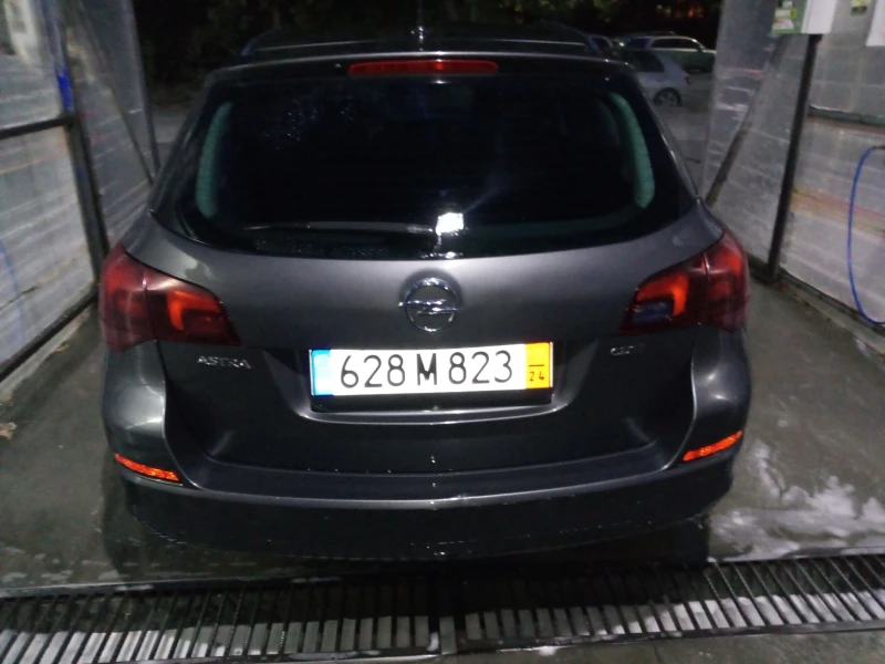 Opel Astra Sport tourer, снимка 4 - Автомобили и джипове - 53058567