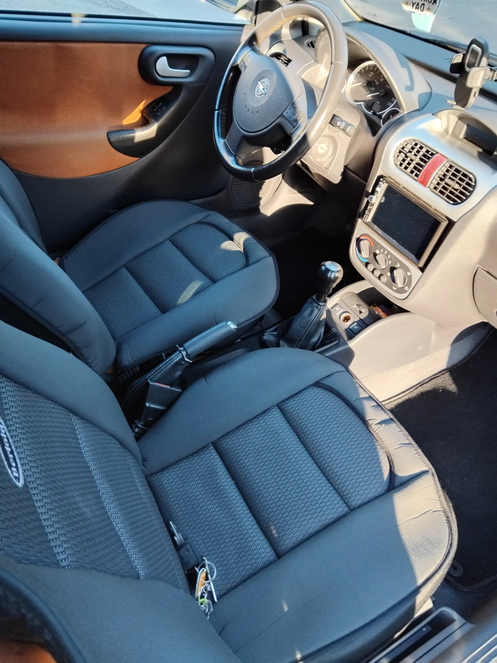 Opel Corsa, снимка 15 - Автомобили и джипове - 56321725