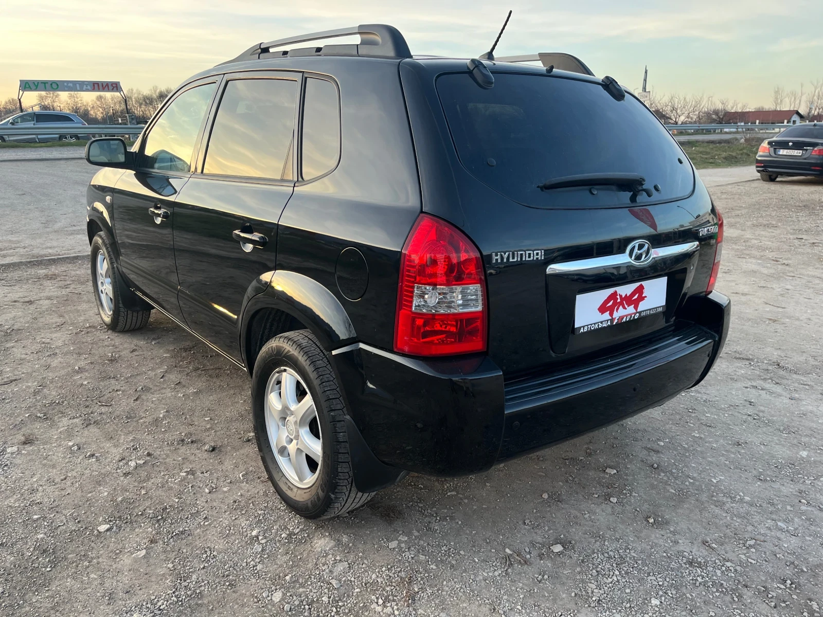 Hyundai Tucson 2.0i-140-GAS-4x4-ITALIA, снимка 11 - Автомобили и джипове - 53807133