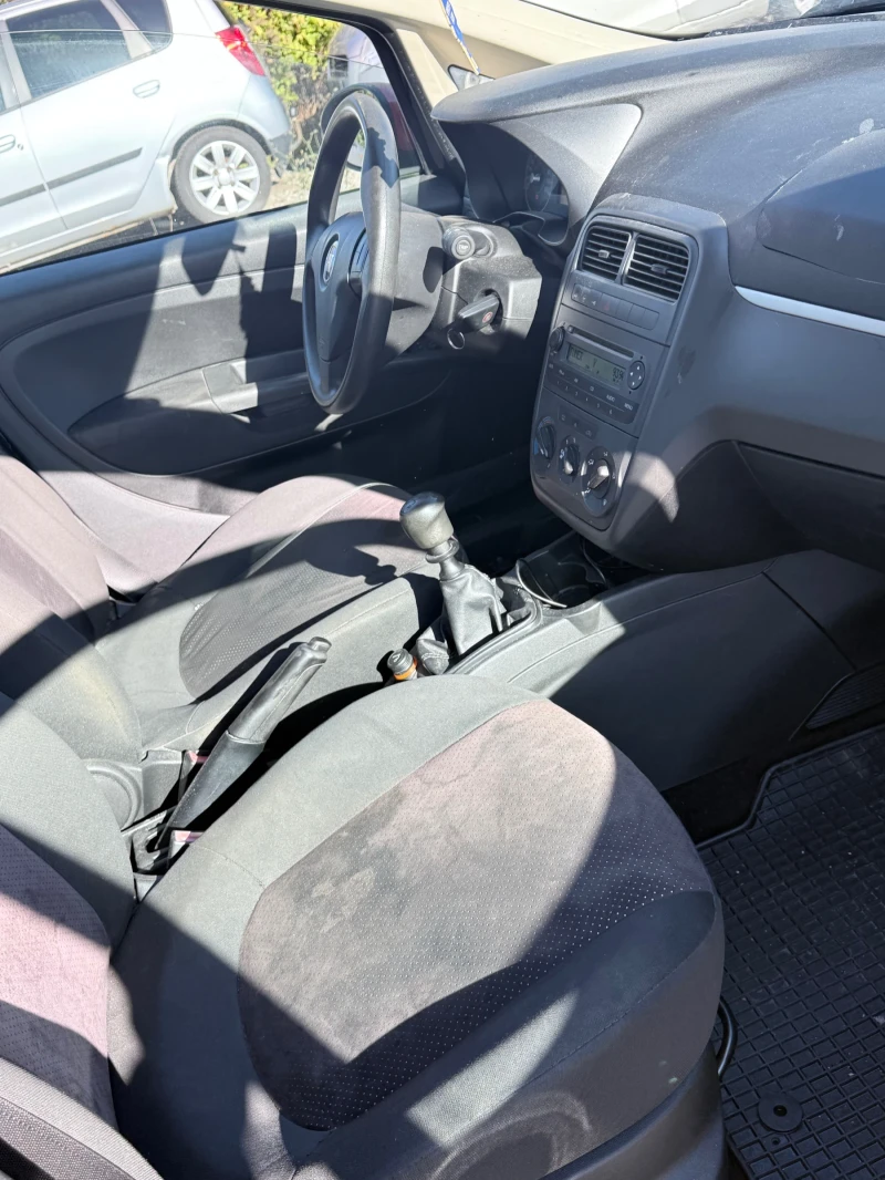 Fiat Punto 1.2i klima, снимка 9 - Автомобили и джипове - 52107549