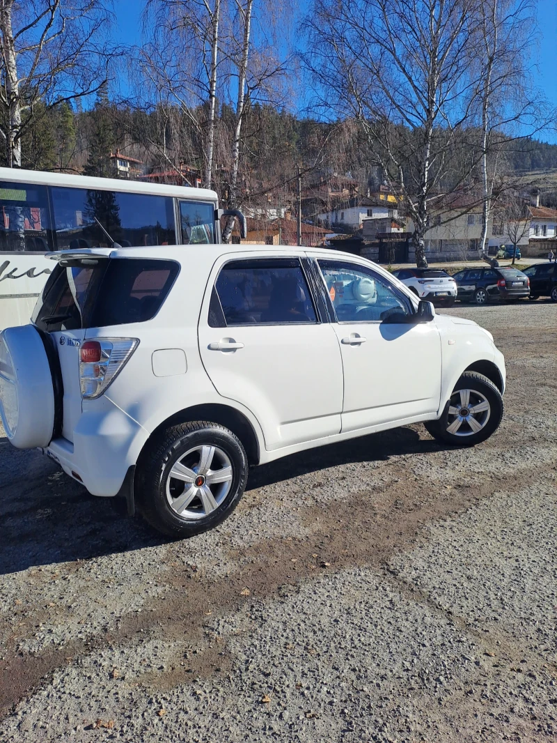 Daihatsu Terios 1.5газ, бензин, кожа, снимка 14 - Автомобили и джипове - 47679760