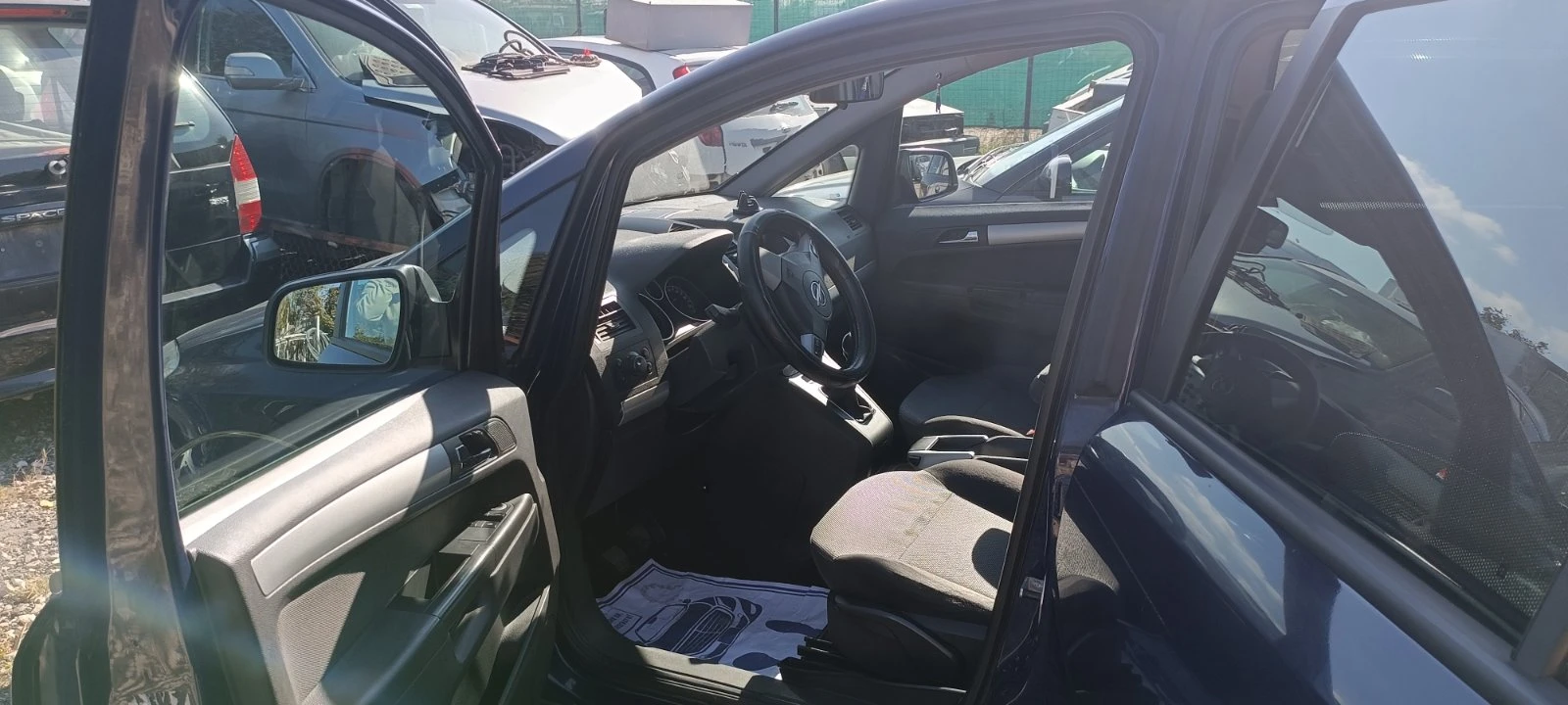 Opel Zafira 1.9TDI, снимка 12 - Автомобили и джипове - 56119501