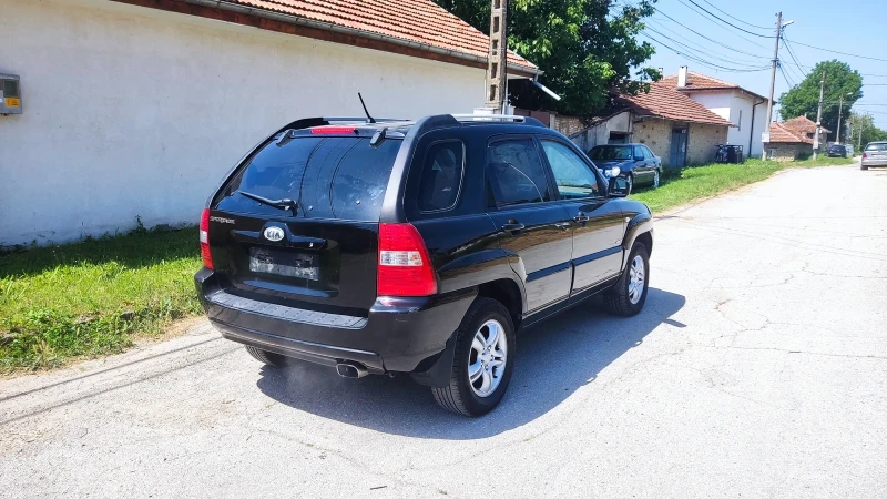 Kia Sportage 2.0 бензин, 4х4, снимка 4 - Автомобили и джипове - 47722843