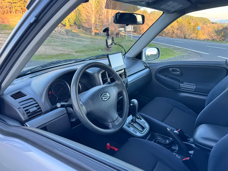 Suzuki Grand vitara 2.5 158hp Автомат, снимка 9 - Автомобили и джипове - 52814812