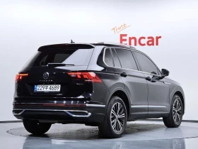 VW Tiguan 2.0 TDI 4-Motion Premium| 150к.с.| ВКЛ.ТЕХНОТЕСТ - 23000 € / 44984.09 лв. - 38100416 2