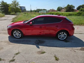 ������ Mazda 3