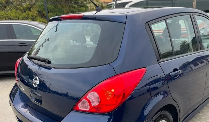 Nissan Tiida  - изображение 4