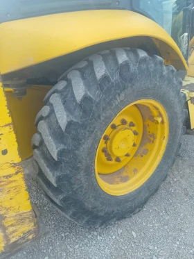 Багер Komatsu WB93R, снимка 11