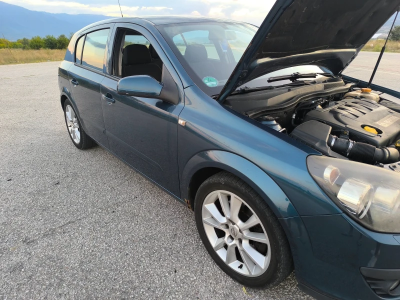 Opel Astra, снимка 11 - Автомобили и джипове - 48478632