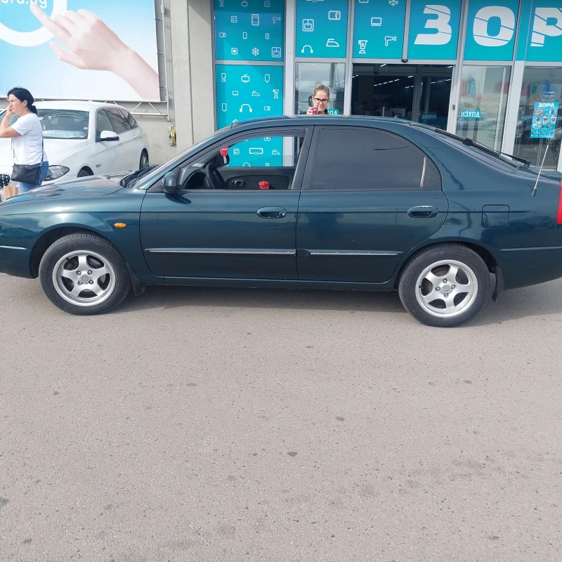 Kia Shuma 1.6 газ, снимка 1 - Автомобили и джипове - 47442521