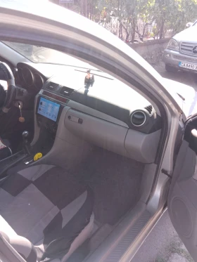 Mazda 3 1.4 | Mobile.bg    13