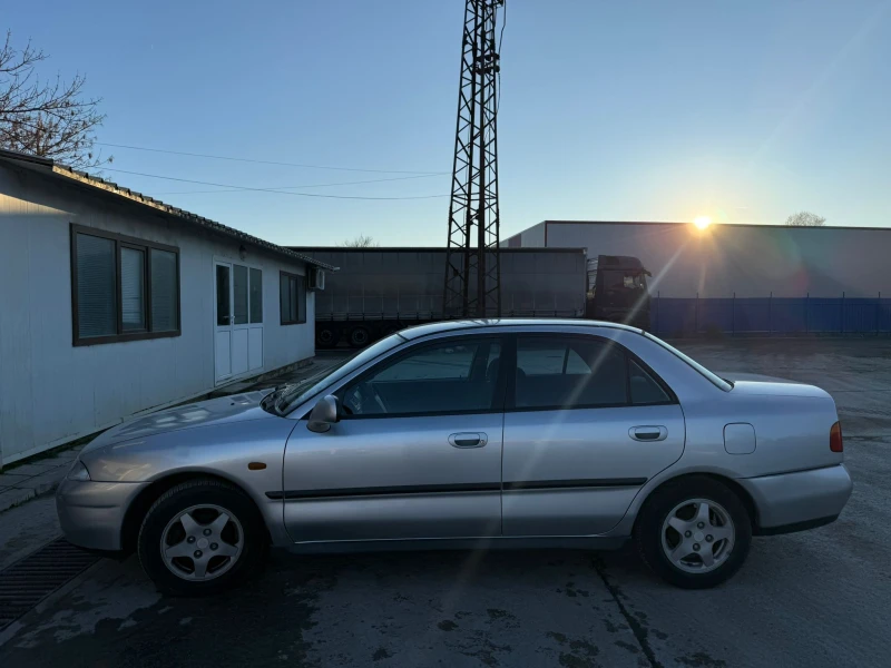 Mitsubishi Carisma LS 1.8 КЛИМАТРОНИК, снимка 6 - Автомобили и джипове - 52526742