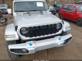 Jeep Wrangler 4XE SUMMIT 4XE - 28700 € / 56132.32 лв. - 65144720 6