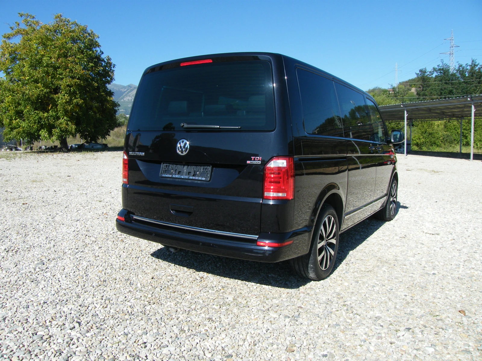VW Multivan 2.0 TDI 4x4 NAVI, снимка 4 - Бусове и автобуси - 56112612