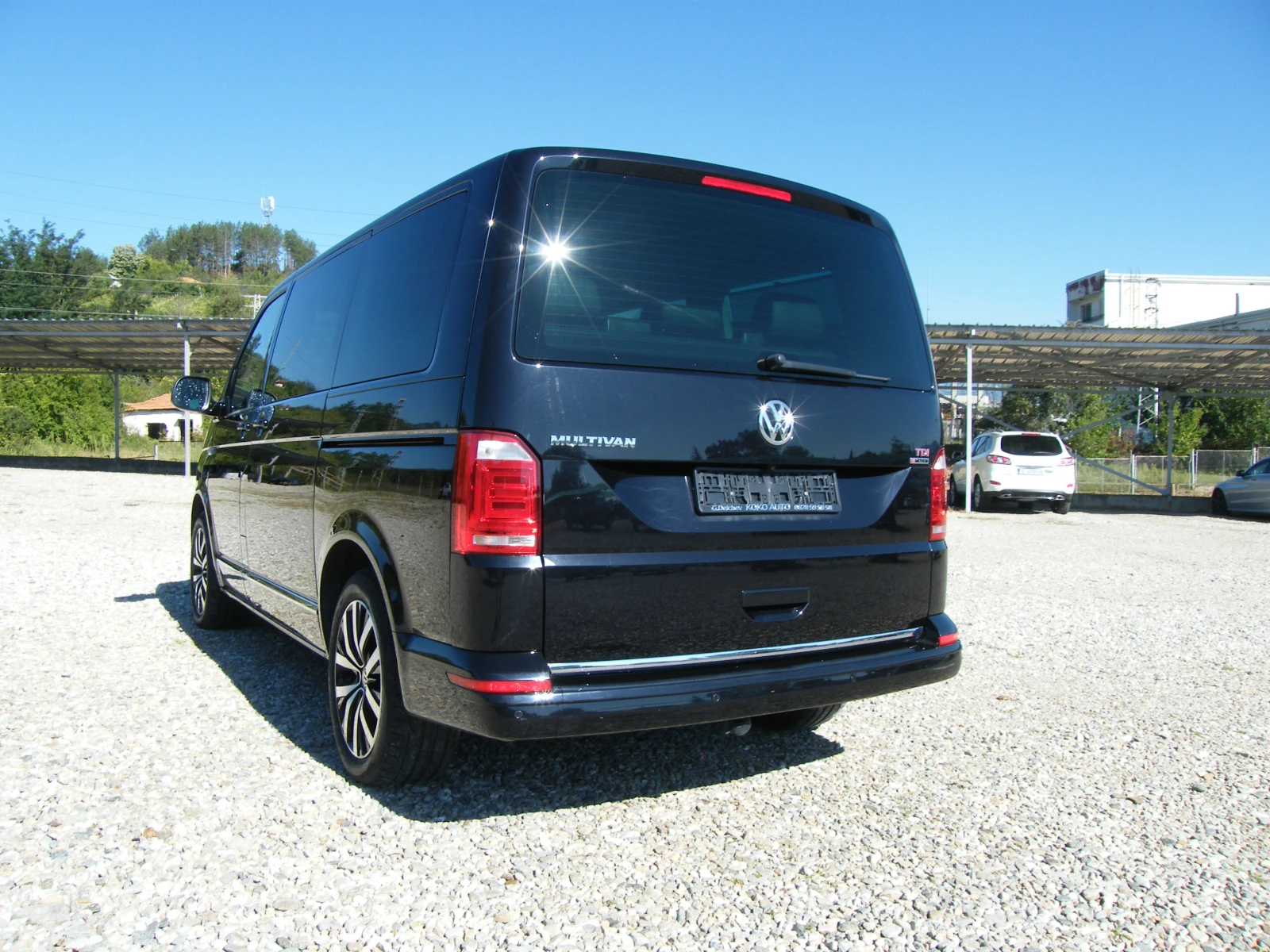 VW Multivan 2.0 TDI 4x4 NAVI, снимка 5 - Бусове и автобуси - 56112612
