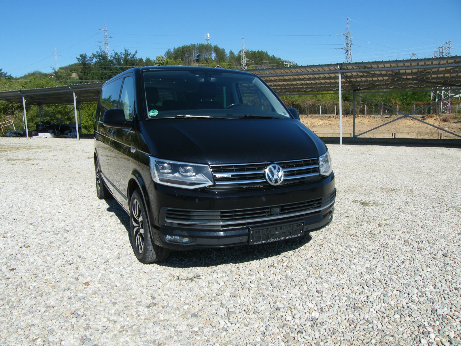 VW Multivan 2.0 TDI 4x4 NAVI, снимка 2 - Бусове и автобуси - 56112612