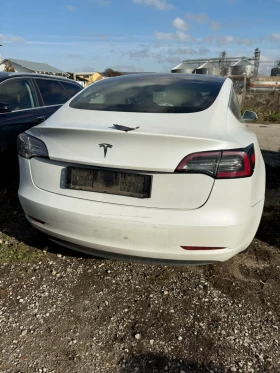 Tesla Model 3 стандарт рейндж 302, снимка 1