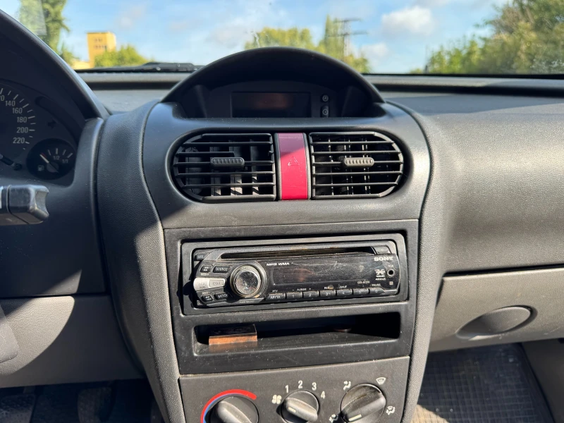 Opel Corsa 1.2 16V, снимка 6 - Автомобили и джипове - 52238293