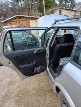 Opel Astra Бензин 1.2 75к.с.  Z12XE, снимка 9