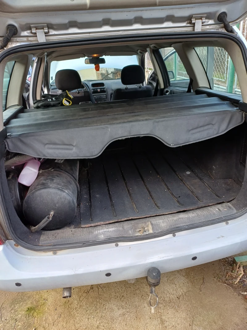 Opel Astra Бензин 1.2 75к.с.  Z12XE, снимка 10 - Автомобили и джипове - 52873920