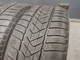 Гуми Зимни 245/45R18, снимка 1 - Гуми и джанти - 43985903