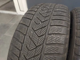 Гуми Зимни 245/45R18, снимка 4 - Гуми и джанти - 43985903