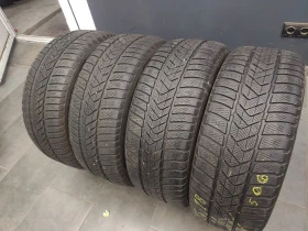 Гуми Зимни 245/45R18, снимка 5 - Гуми и джанти - 43985903