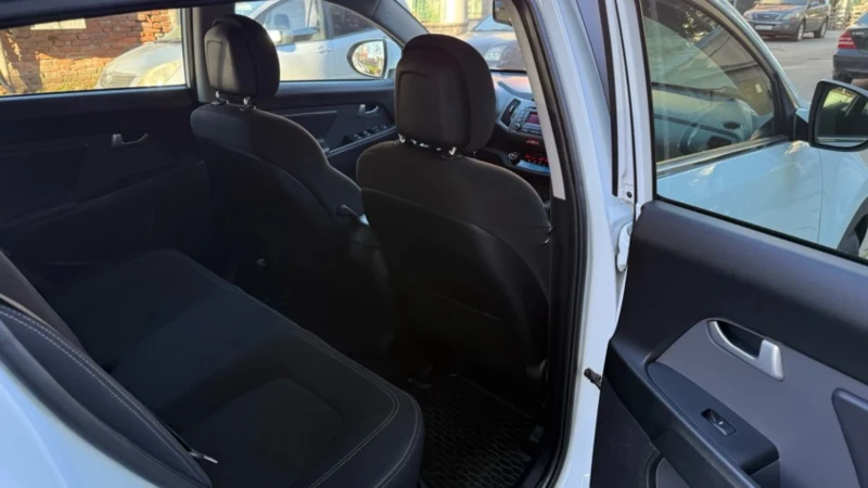 Kia Sportage 1.7D, снимка 13 - Автомобили и джипове - 53350997