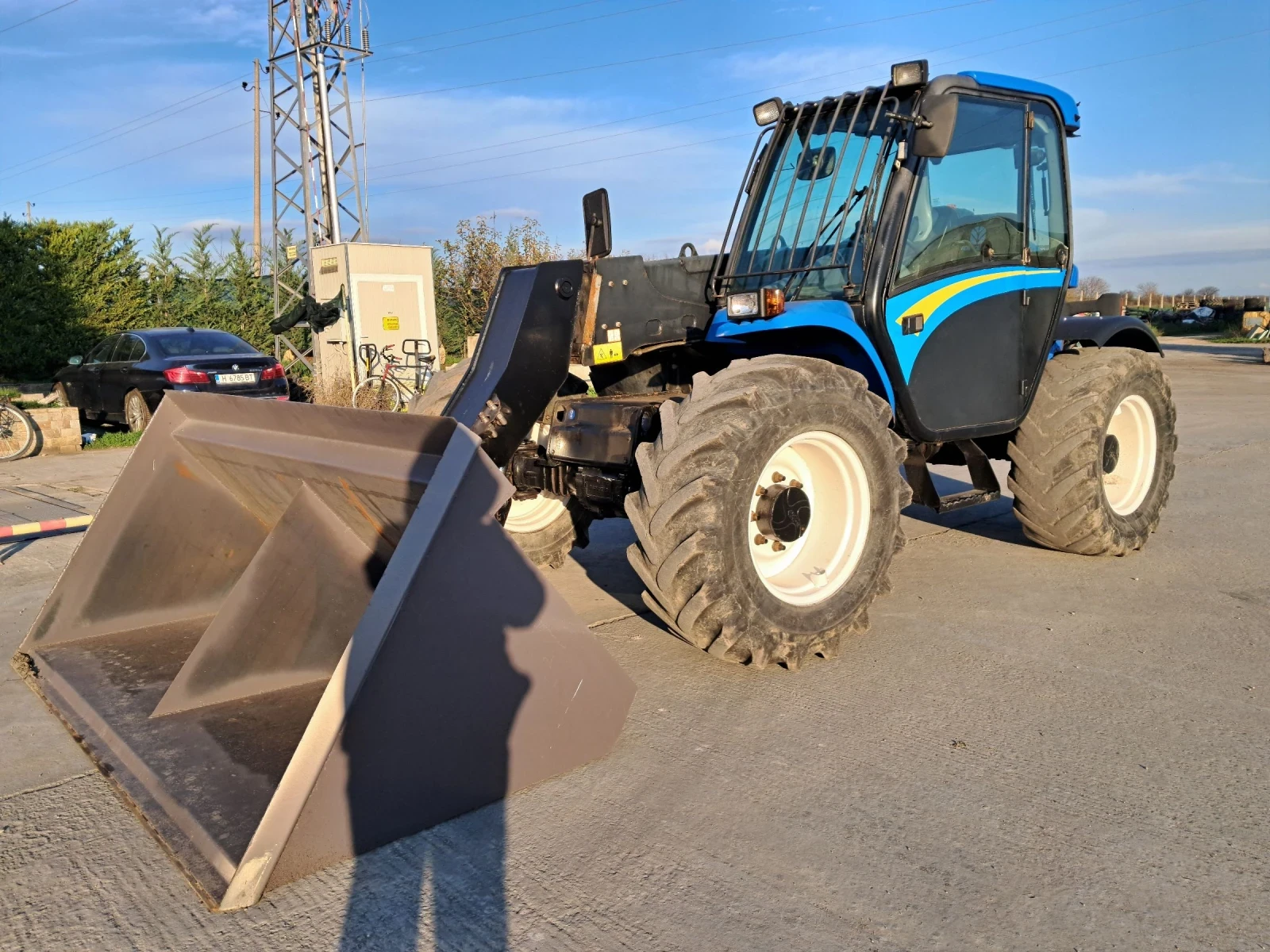 Телескопичен товарач New Holland Lm415, снимка 1