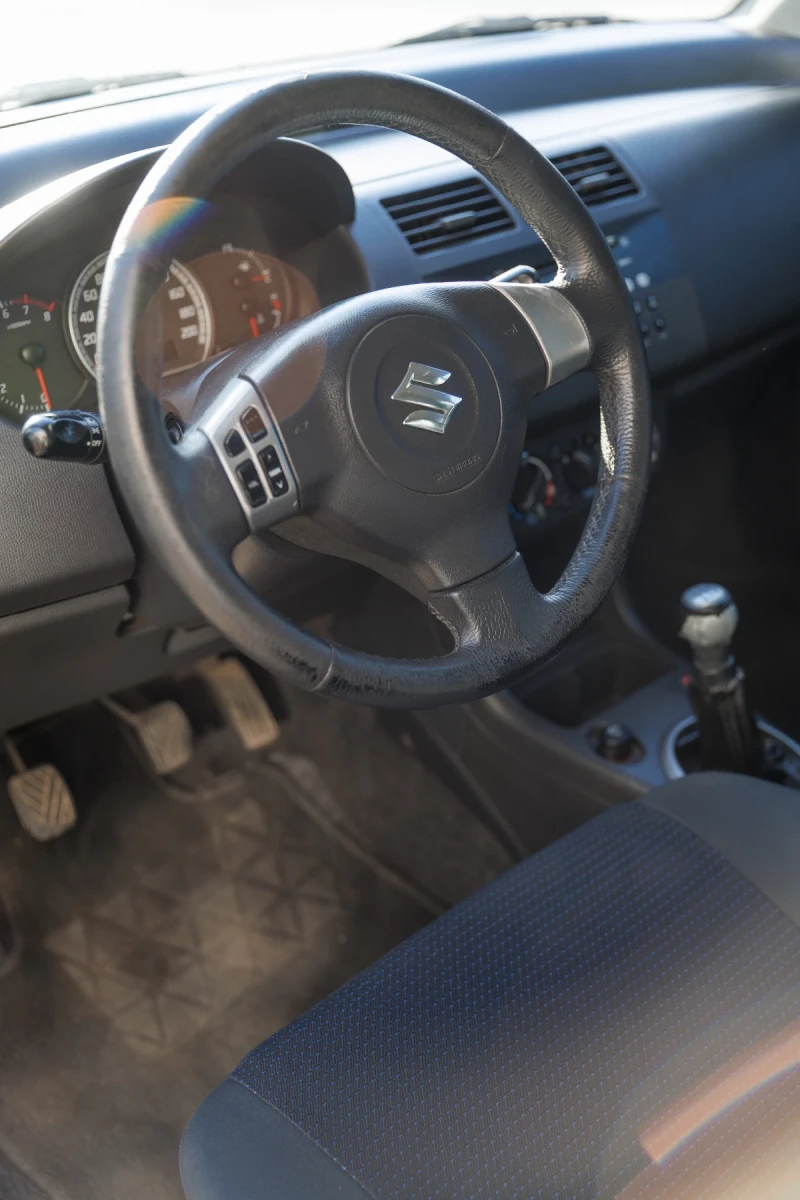 Suzuki Swift, снимка 12 - Автомобили и джипове - 51964658