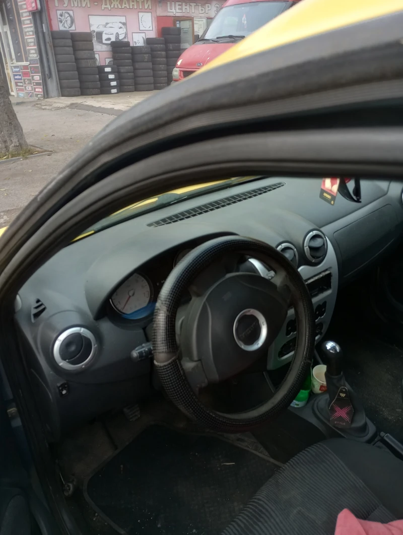 Dacia Logan 1.6, снимка 11 - Автомобили и джипове - 52834530
