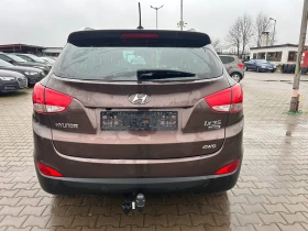 Hyundai IX35 2.0CRDI 4WD AVTOMAT/PANORAMA/KOJA/NAVI EURO 5 - 14300 лв. / 7311.47 € - 69669768 7