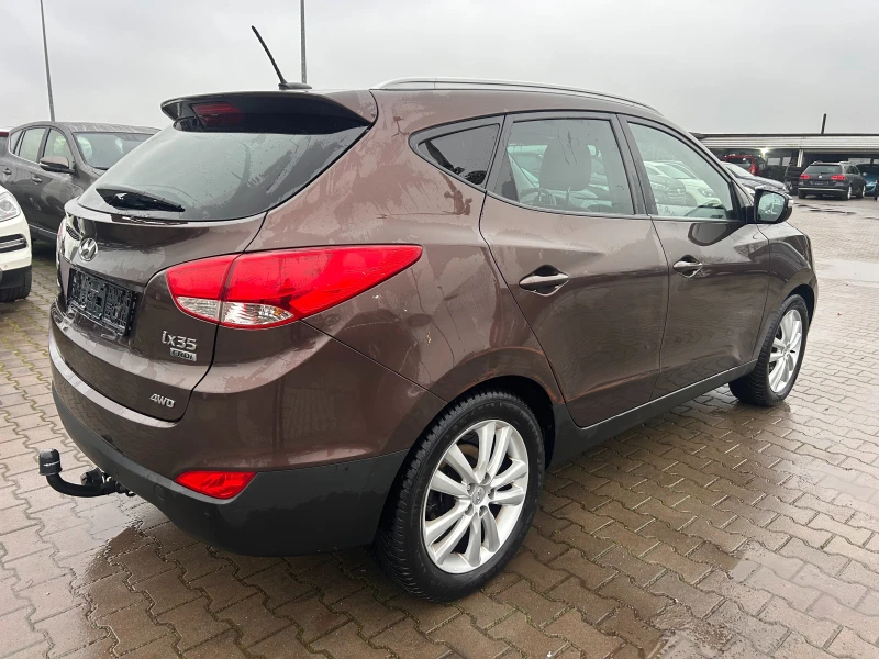 Hyundai IX35 2.0CRDI 4WD AVTOMAT/PANORAMA/KOJA/NAVI EURO 5, снимка 6 - Автомобили и джипове - 52576127