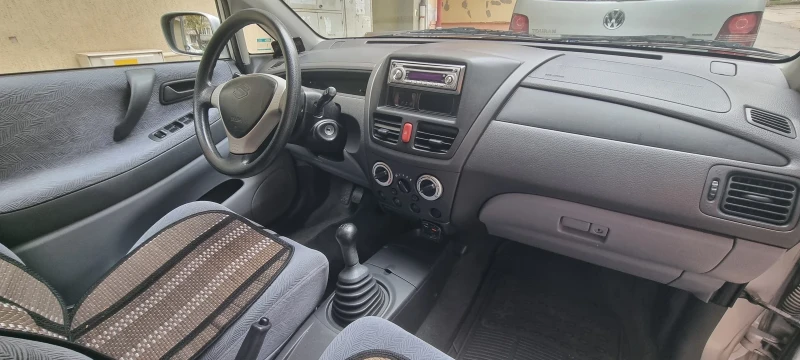 Suzuki Liana, снимка 4 - Автомобили и джипове - 47298696