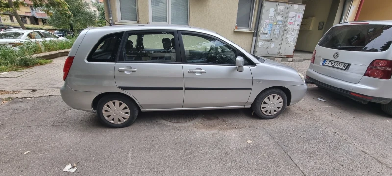 Suzuki Liana, снимка 7 - Автомобили и джипове - 47298696