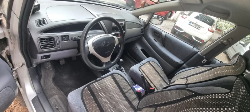 Suzuki Liana, снимка 3 - Автомобили и джипове - 47298696