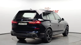 BMW X7 M50i* HUD* 360* МОНИТОРИ* ПАНО* КОЖА* ОБДУХВ, снимка 2