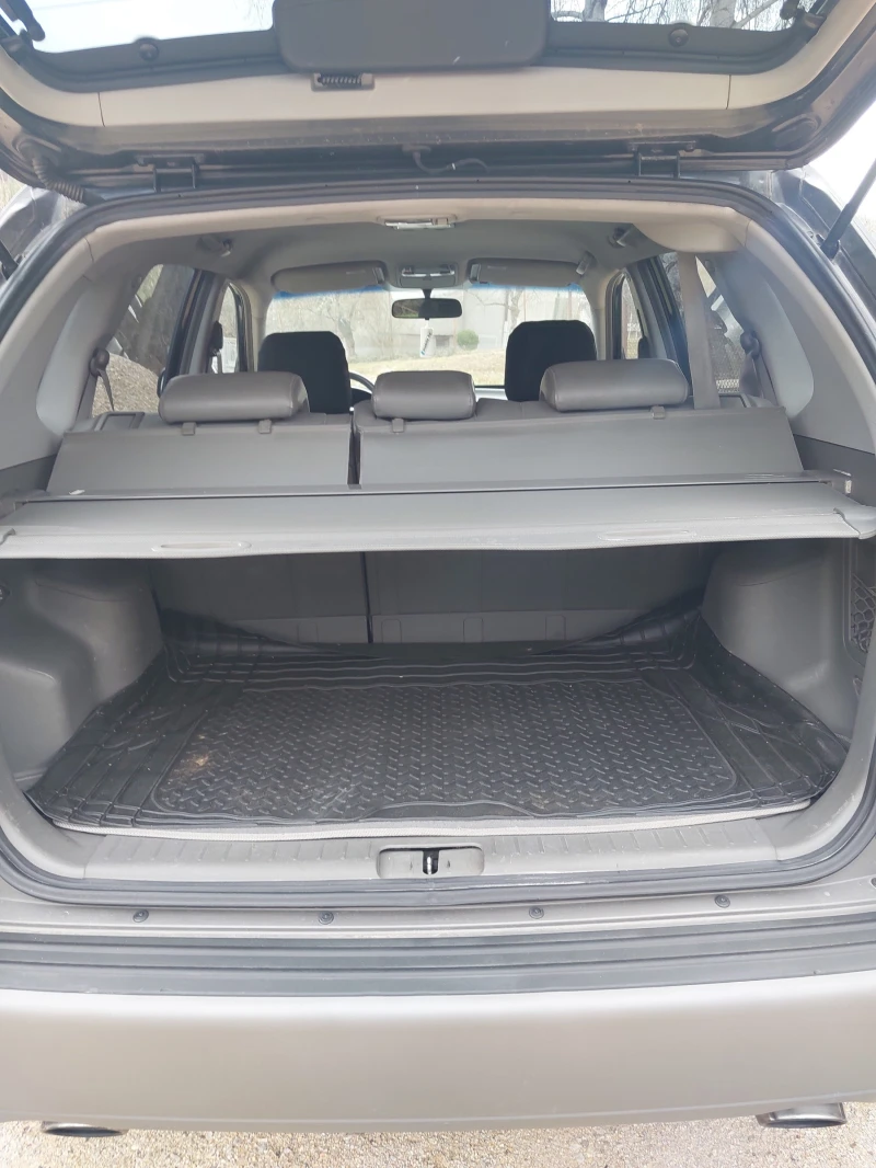 Hyundai Tucson 2.0crdi, снимка 12 - Автомобили и джипове - 51358055