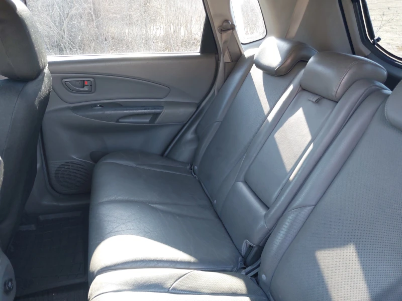 Hyundai Tucson 2.0crdi, снимка 13 - Автомобили и джипове - 51358055