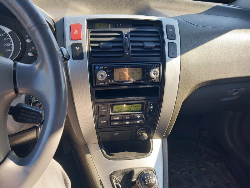 Hyundai Tucson 2.0crdi, снимка 8 - Автомобили и джипове - 51358055