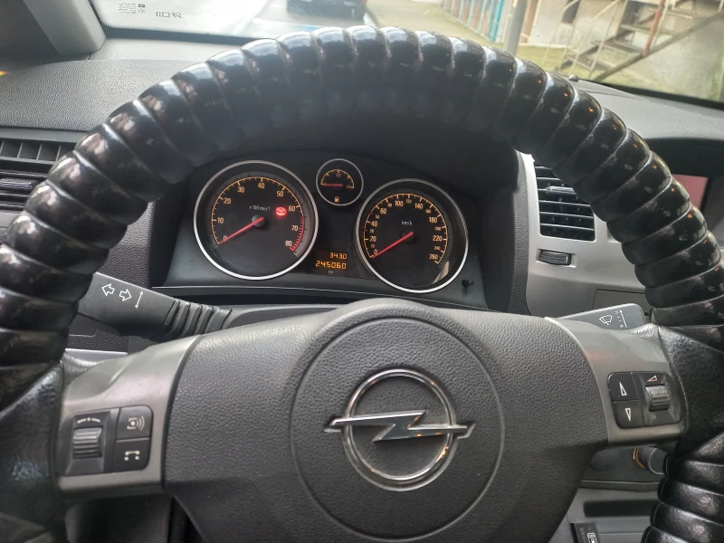 Opel Zafira 1.8 140 hp бензин-газ 7-местен , снимка 7 - Автомобили и джипове - 52553405