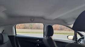 Peugeot 208 1.4 хди, снимка 11